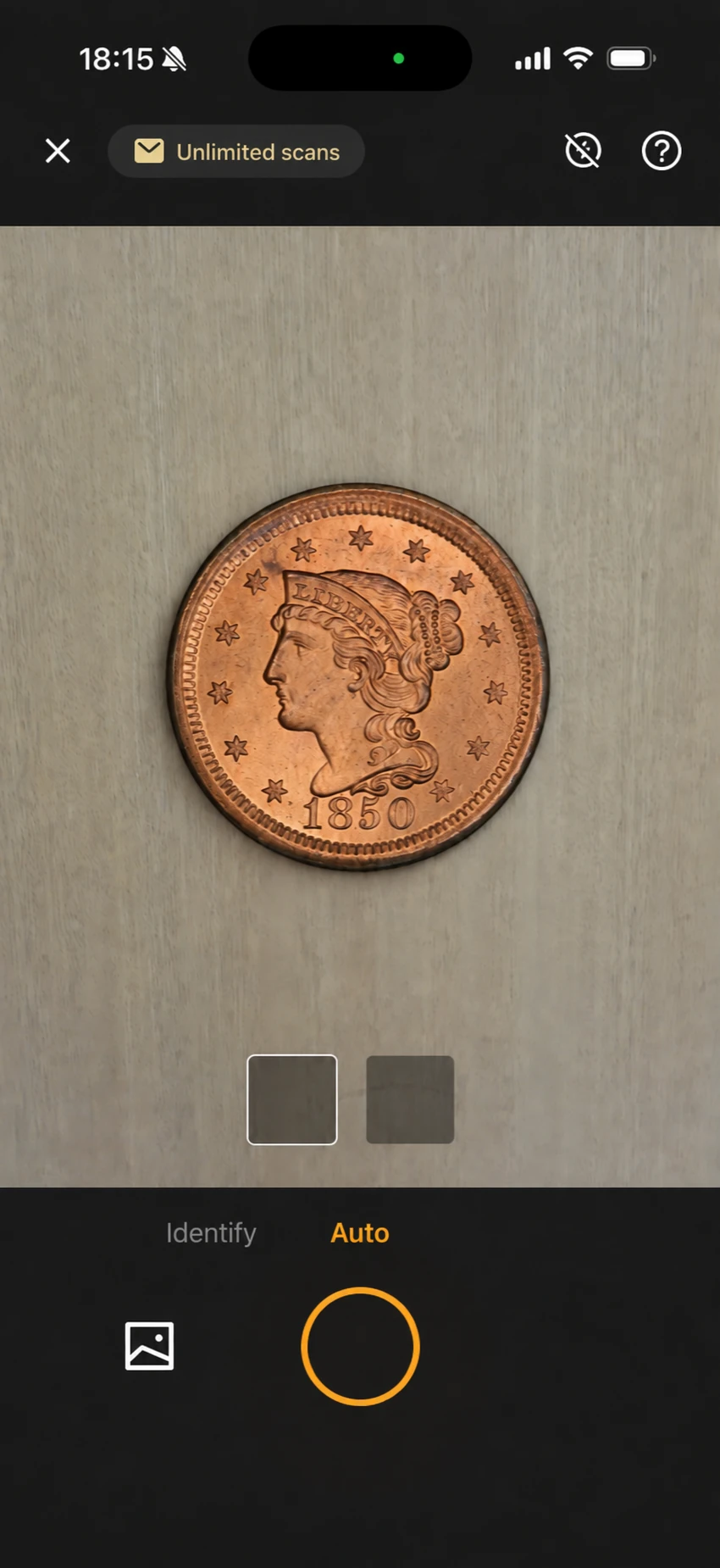 CoinSnap camera screen with an 1850 U.S. one-cent coin centered in the camera view